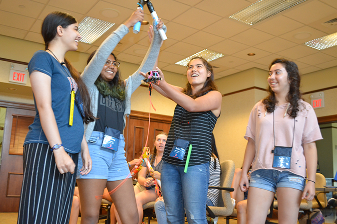 A team of campers present the prosthetic devices they created.